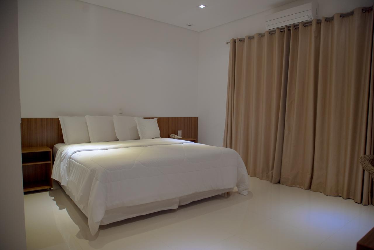 Quarto com Cama Queen-Size e Varanda